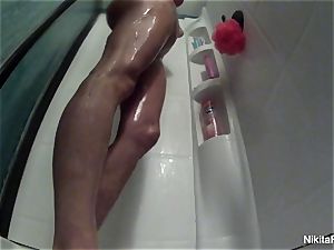 Nikita takes a gorgeous shower