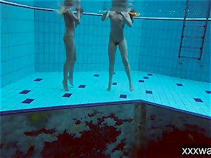 sizzling Russian femmes swimming in the pool