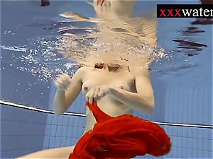 fantastic steamy female swimming in the pool