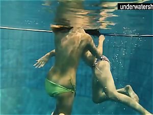 two cool amateurs showcasing their figures off under water